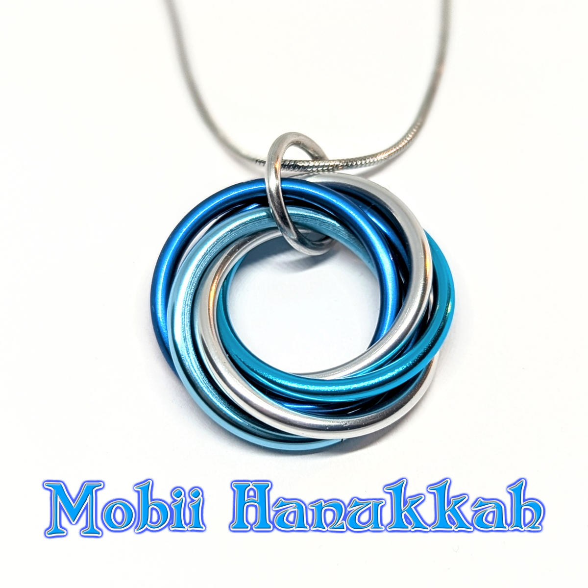 Möbii® Happy Holidays - Winter Celebrations - Stylish Discreet Fidget Fashion Wear: Necklaces, Earrings, Keychains